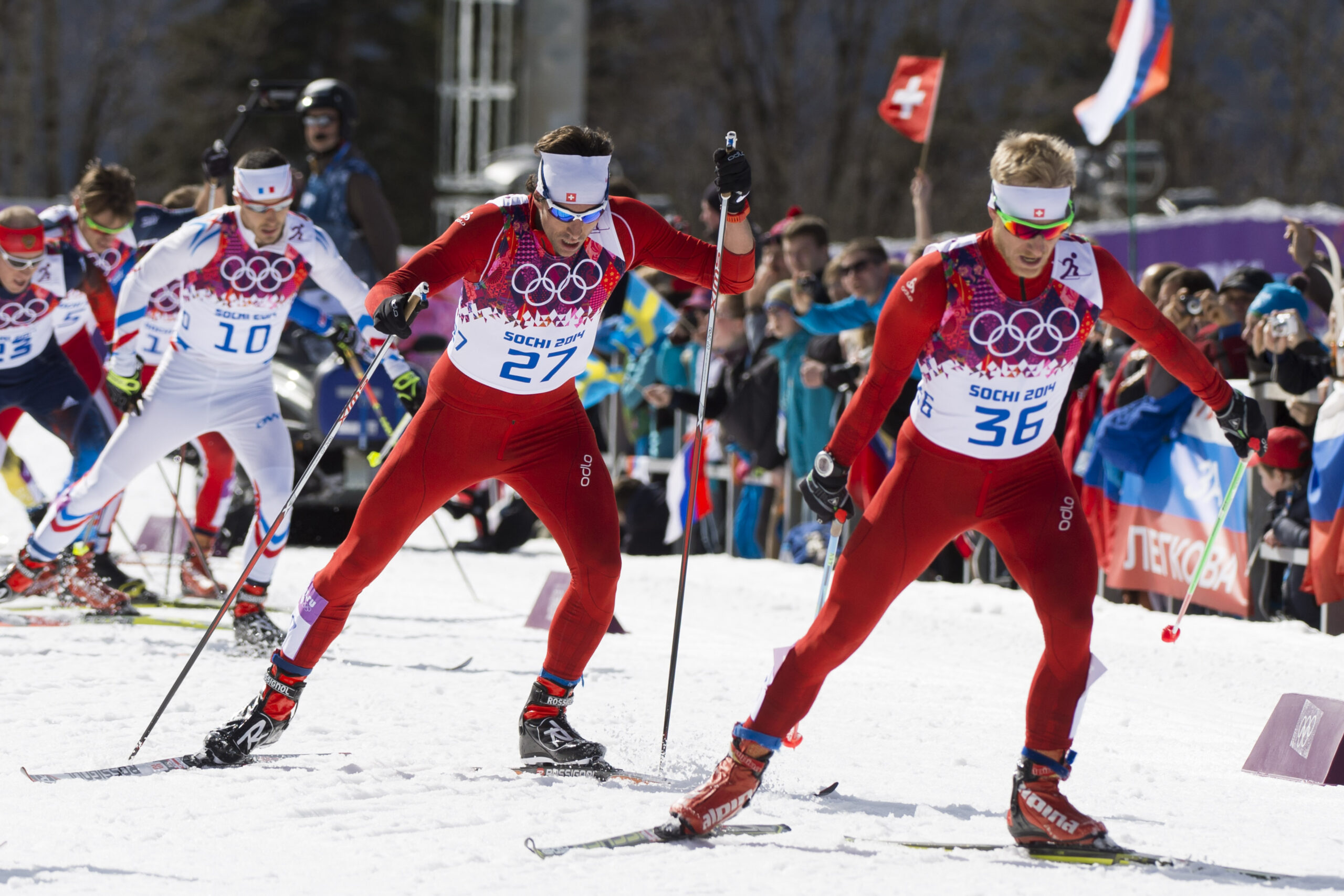 Curdin Perl, left, and Remo Fischer, right, of Switzerland in action during the men's cross country mass start 50km competition at the XXII Winter Olympics 2014 Sochi in Krasnaya Polyana, Russia, on Sunday, February 23, 2014. (KEYSTONE/Jean-Christophe Bott)